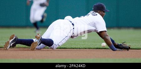 Detroit Tigers shortstop Edgar Renteria throws to first base against the  Washington Nationals in a Grapefruit League spring training baseball game  in Lakeland, Fla., Tuesday, March 18, 2008. (AP Photo/Paul Sancya Stock
