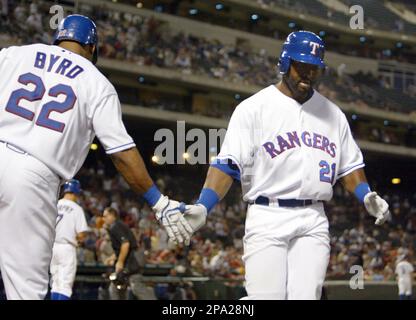 Texas Rangers' Gerald Laird, left, and teammate Jason Botts celebrate after  Botts hit a home run during a baseball game against the Minnesota Twins,  Sunday, April 27, 2008, in Arlington, Texas. (AP