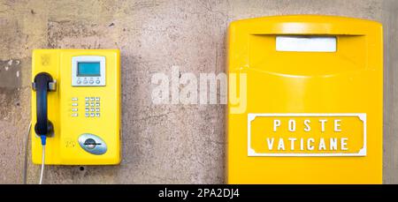 Detail of the traditional yellow post box in Vatican City, Rome Stock Photo