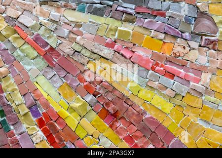 Colorful stone mosaic with chaotic pattern, seamless. Marble-stone mosaic texture. Stock Photo