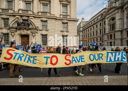 London, UK. 11th Mar, 2023. Marching down Whitehall - Save our NHS protest march and rally starts UCLH and heads to Westminster. Credit: Guy Bell/Alamy Live News Stock Photo
