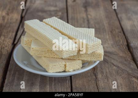 Delicious Russian waffles on a wooden background in a rustic style, close-up, side view Stock Photo