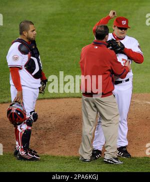 Brian Schneider (left) and Chad Cordero of the Washington Nationals,  celebrate victory against the Chicago Cubs on May 15, 2005. The Nationals  defeated the Cubs 5-4, to take the 3-game series three