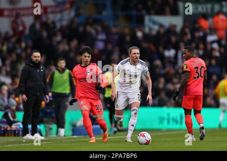 Kaoru Mitoma of Brighton & Hove Albion tussles with Luke Ayling of Leeds United during the Premier League match between Leeds United and Brighton & Hove Albion at Elland Road, Leeds on Sunday 12th March 2023. (Photo: Pat Scaasi | MI News) Credit: MI News & Sport /Alamy Live News Stock Photo