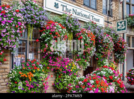 Flowery facade of the National Trust shop in Wells Somerset UK Stock Photo