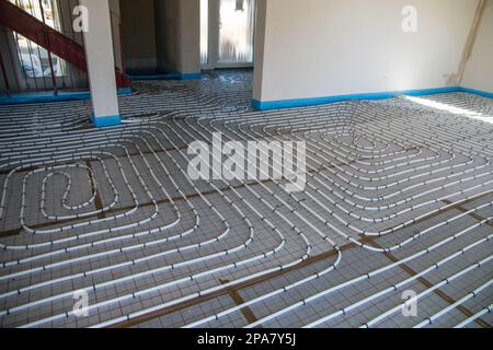 Underfloor heating in a new building Stock Photo
