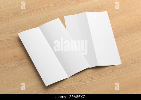 Half-folded flyer A4 vertical booklet mock up on wooden background. Side view Stock Photo
