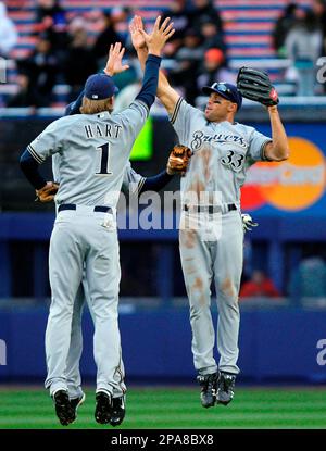 Milwaukee Brewers' Ryan Braun (8), Gabe Kapler (33) and Mike