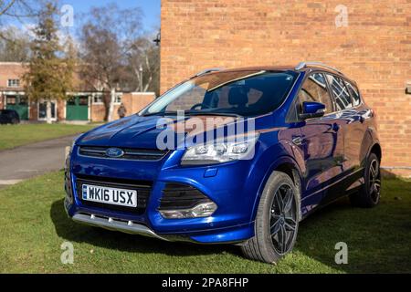 Second generation Ford Kuga SUV, black metallic color, panoramic ceiling,  4x4 traction, automatic transmission, isolated in an empty parking lot  Stock Photo - Alamy