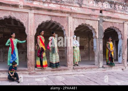 Beautiful Rajasthani women wearing traditional jewellery and colourful ...