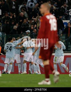 Lazio players cheer after scoring during the Italian Serie A