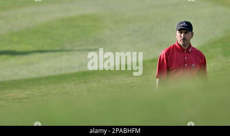 Jeev Milkha Singh of India watches his shot during the third round