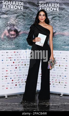 Milan, Italy. 11th Mar, 2023. Milan, Italy Rocio Munoz Morales presents his book WHERE THE SUN IS BORN during the Festival Sguardi Altrove 2023 In the picture: Rocio Munoz Morales with his book Credit: Independent Photo Agency/Alamy Live News Stock Photo