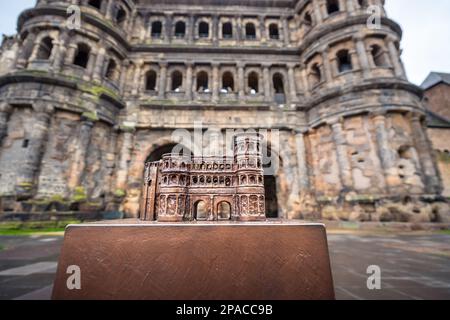 Miniature model of Porta Nigra in front of the real one - Trier, Germany Stock Photo