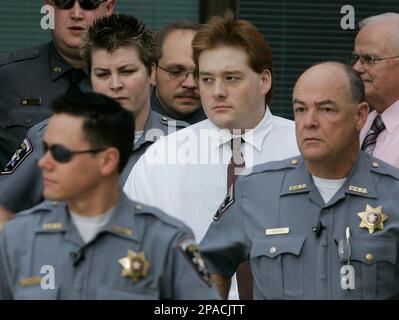 Kevin Underwood, Center, Is Escorted Out Of The Courthouse By Deputies ...