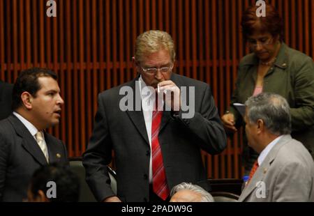 senators who smoke cigarettes Mexican federal congressman Javier Gonzalez Garza smokes a cigarette during a parliament session in Mexico City, Tuesday, Feb. 26, 2008. The Senate passed tougher laws to ban smoking in public sessions yet Smoking is back in the