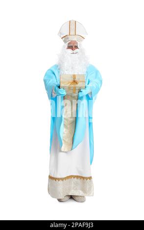 Full length portrait of Saint Nicholas with present on white background Stock Photo