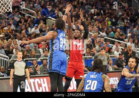 Orlando, Florida, USA, March 11, 2023, Miami Heat guard Victor Oladipo #4 shoots a three in the first half at the Amway Center. (Photo Credit: Marty Jean-Louis/Alamy Live News Stock Photo
