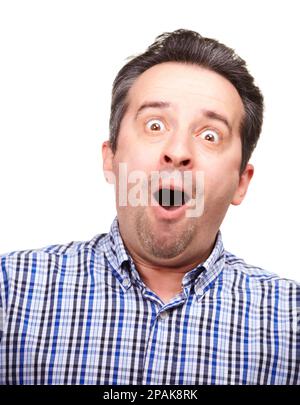 Confidence grows with age. A cropped portrait of a middle-aged man making a face, isolated on white. Stock Photo