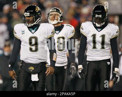 Tennessee Titans wide receiver Roydell Williams, front, is knocked down by  Jacksonville Jaguars cornerback Rashean Mathis (27) in the fourth quarter  of an NFL football game in Nashville, Tenn., Sunday, Nov. 11