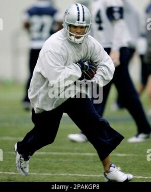 Washington Redskins cornerback Shawn Springs (24) breaks up a pass intened  for Dallas Cowboys wide receiver Terry Glenn. The Redskins defeated the  Cowboys, 35-7, at FedEx Field in Landover, Maryland, Sunday, December