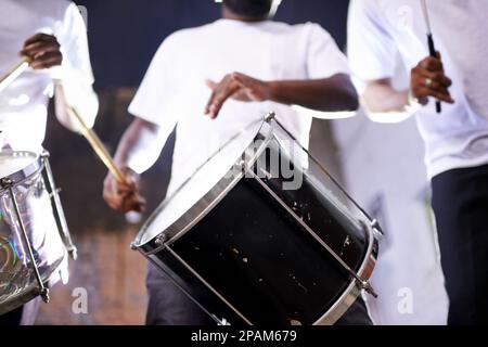 Feeling the rhythm in the drums. a group of dummers. Stock Photo