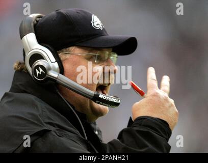 Dallas Cowboys' Patrick Watkins grimaces as medical staff looks at his leg  in the fourth quarter against the Philadelphia Eagles, Sunday, December 16,  2007, at Texas Stadium in Irving, Texas. The Eagles