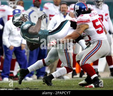 Washington Redskins Santana Moss runs against New York Giants Kawika  Mitchell during the fourth quarter at FedEx Field on September 23, 2007.  The Giants defeated the Redskins 24-17. (UPI Photo/Kevin Dietsch Stock