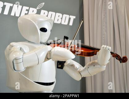 Toyota violin playing store robot