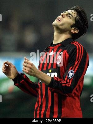 AC Milan Brazilian forward Ricardo Kaka, right, fights for the ball