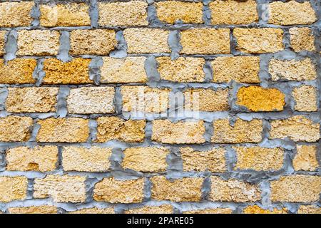 Limestone laid stone bricks with cement background texture. Natural ...