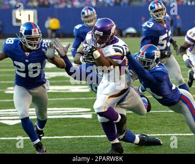 FILE- In this file photo taken Aug. 25, 2010, in Seattle, Minnesota Vikings  running back Chester Taylor runs pushing off Seattle Seahawks' Chuck Darby.  Taylor, who is now with the Chicago Bears