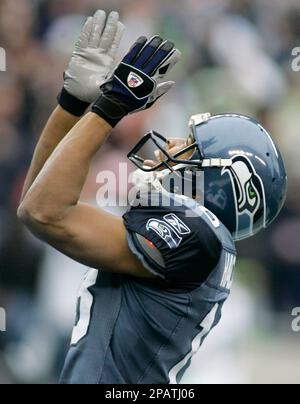 Seattle Seahawks' wide receiver D.J. Hackett celebrates after catching  20-yard touchdown pass from Matt Hasselbeck in the fourth quarter of their  first round NFC Wildcard playoff game against the Washington Redskins at