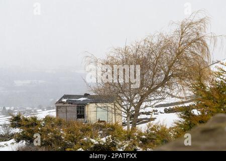 Country Side - Wild places  / Snow Hut in isolated place - Old house in the meadow. Stock Photo