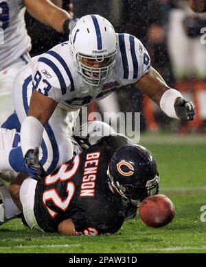 Chicago Bears running back David Montgomery (32) is tackled by Detroit  Lions linebacker Jalen Reeves-Maybin (44) during the second half of an NFL  football game, Sunday, Oct. 3, 2021, in Chicago. (AP