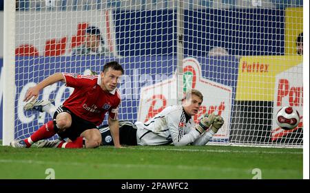 schalkes keeper manuel neuer right watches hamburgs ivica olic left scoring during the german first division bundesliga soccer match between fc schalke 04 and hamburger sv in gelsenkirchen germany saturday nov 10 2007 ap photomartin meissner no mobile use until 2 hours after the match website users are obliged to comply with dfl restrictions see instructions for details 2pawfc2