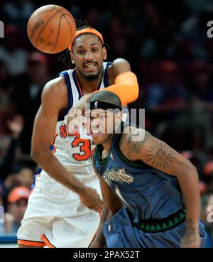 New York Knicks' Renaldo Balkman, left, and David Lee, center, battle ...