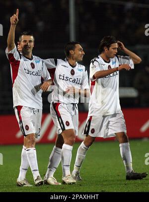 Cagliari s Michele Fini first from left is congratulated by