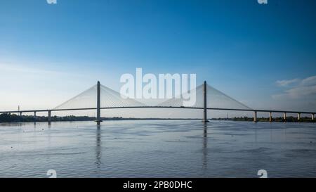 Approaching the Tsubasa Bridge across the Mekong River in Kandal Province, Cambodia. Stock Photo