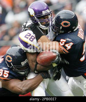 Chicago Bears line backer Brian Urlacher (54) laments the loss to