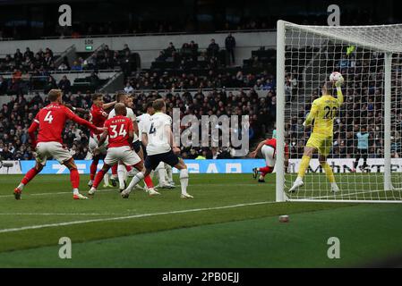 London, UK. 12th Mar, 2023. Serge Aurier of Nottingham Forest has an effort on goal saved by Tottenham Hotspur Goalkeeper Fraser Forster during the Premier League match between Tottenham Hotspur and Nottingham Forest at Tottenham Hotspur Stadium, London, England on 11 March 2023. Photo by Ken Sparks. Editorial use only, license required for commercial use. No use in betting, games or a single club/league/player publications. Credit: UK Sports Pics Ltd/Alamy Live News Stock Photo