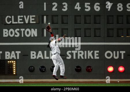 Cleveland Indians left fielder Kenny Lofton (7) and center fielder Grady  Sizemore celebrate after the Indians beat the Boston Red Sox, 4-2, in Game  3 of the American League Championship baseball series