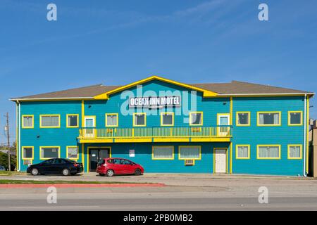 Galveston, Texas, USA - February 2023: Front exterior view of the Ocean Inn Motel on the seafront in Galveston Stock Photo