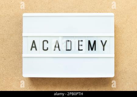 Lightbox with word academy on wood background Stock Photo