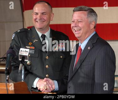 Nebraska Gov. Dave Heineman, right, first lady Sally Ganem, center, and ...