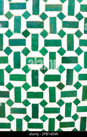 A Green Geometrical Pattern of Rectangles and Diamonds in a Tile Stock Photo