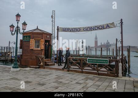 Venice, Italy - 15 Nov, 2022: Gondola station on the banks of the Grand Canal Stock Photo