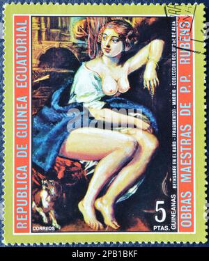 Cancelled postage stamp printed by Equatorial Guinea, that shows Bathsheba at the Fountain by Peter Paul Rubens, circa 1973. Stock Photo