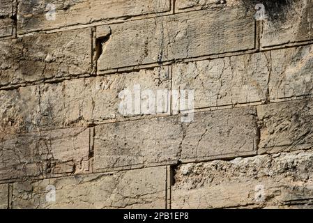 Ancient tephrocyan Eleusinian stone wall known as 'Lycurgio'at the Archaeological Site of Goddess Demeter in Eleusis, Attica Greece. Stock Photo
