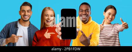Happy shocked multiracial people point finger at smartphone with blank screen, enjoy win Stock Photo